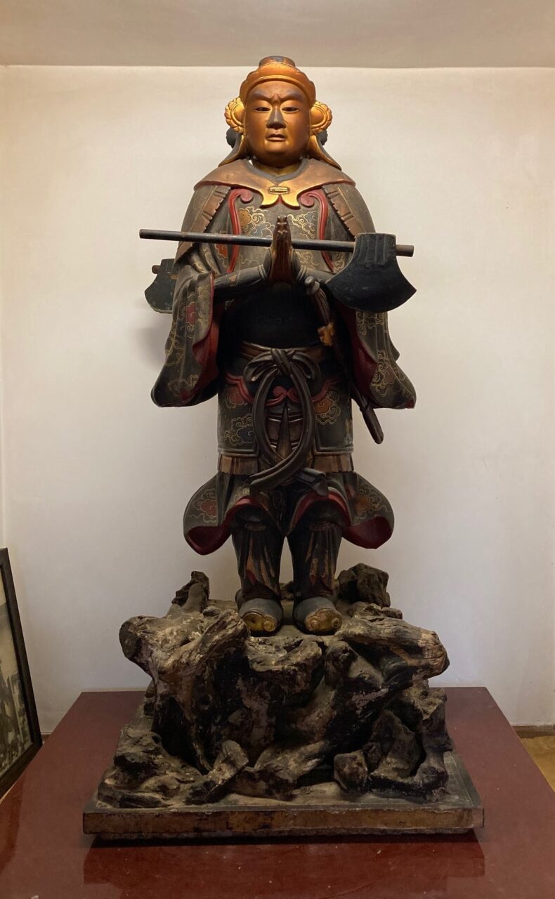 Statue of Ryomen Sukuna holding axe.